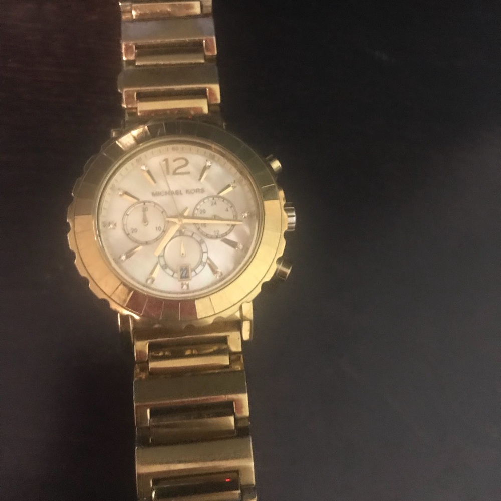 Michael Kor’s gold watch